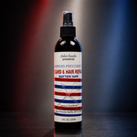 A bottle of Salon Candies Beard & Hair Repair Soften Hair leave-in conditioner, standing upright on a dark surface with dramatic red and blue studio lighting in the background.