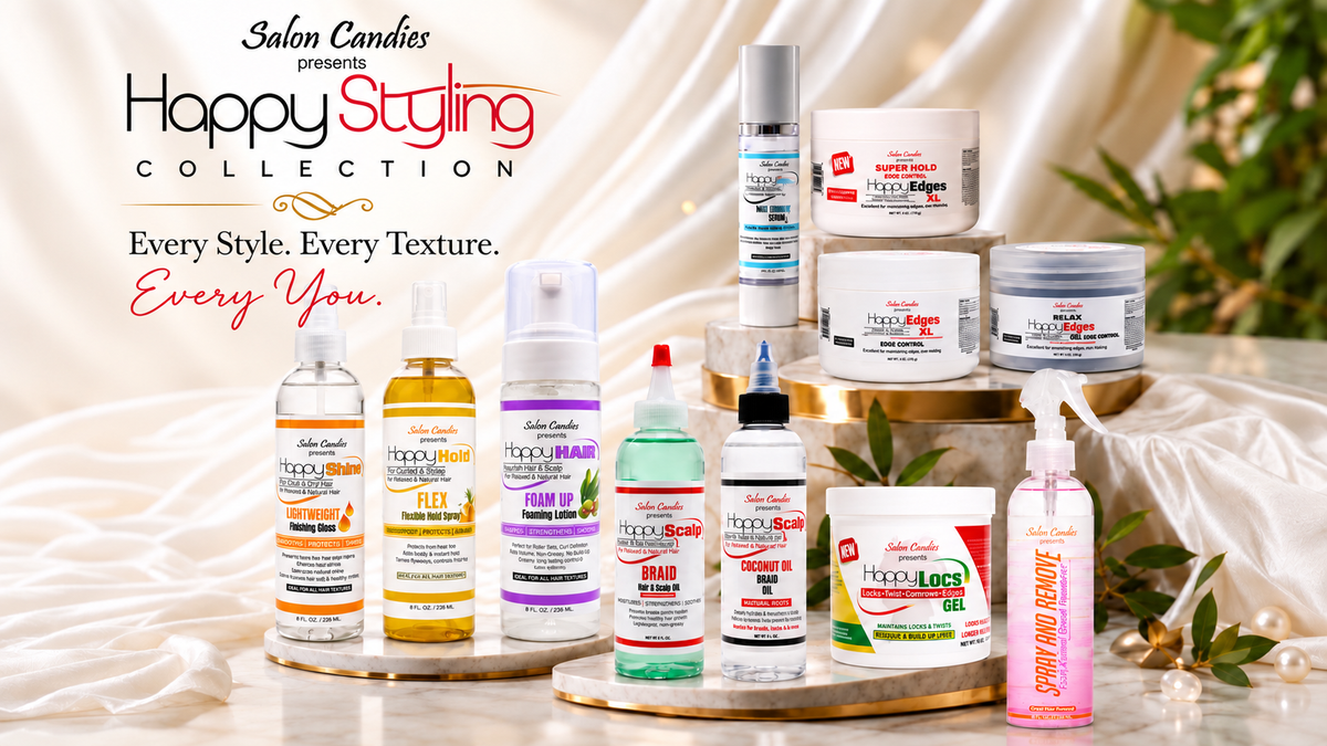 A collection of Salon Candies Happy Styling hair products arranged on gold pedestals with draped satin fabric and green leaves in the background. The products include various sprays, gels, and creams in different colors with labels such as Textured Hair, Flat Iron, and Blow Out.