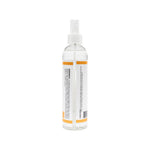 A clear plastic spray bottle with a white spray nozzle and a white label featuring orange accent stripes, shown against a plain white background.