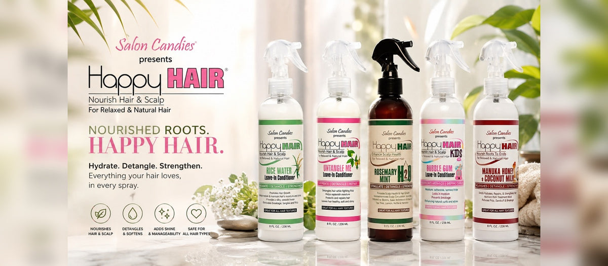 Five Salon Candles Happy Hair nourishing hair and scalp care bottles arranged on a glossy marble surface with a bright, sunlit bathroom-like background and plants around the scene. Visible products include Water-Based Detangle & Conditioner, Nourish Root-Enhancing Treatment, Kids Detangle & Conditioner, Nourish Kids Detangle & Conditioner, and Nutra Shot Lemon Burst.